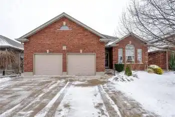View of property with a garage