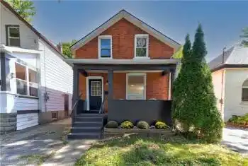 View of front of property featuring a porch